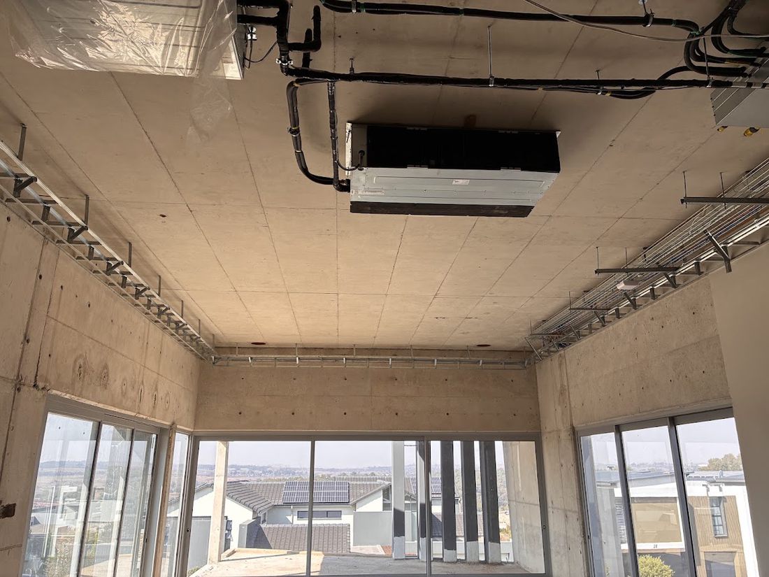 Ceiling services and electrical reticulation in a commercial building