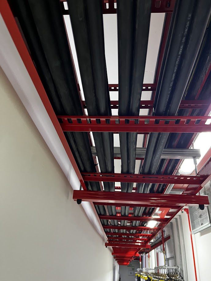 Overhead cable containment and tray run